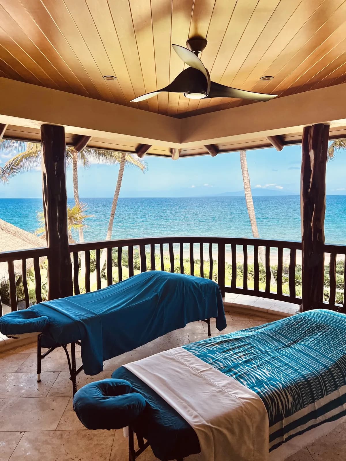 Massage setup on a private oceanfront lanai in Maui